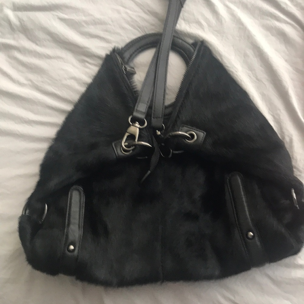 Woman’s  fur shoulder bag and or clutch . New